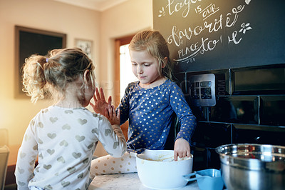 Buy stock photo Baking, high five and children in kitchen in home for activity, connection or learning on weekend. Happy, mixing bowl and girl kids with preparing dough for cookies, biscuits or dessert together.