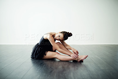 Buy stock photo Relax, dancer and woman in studio for ballet practice, creative ballerina and training. Wall, white background or performer on floor with elegance, art or space for grace, body or dancing routine