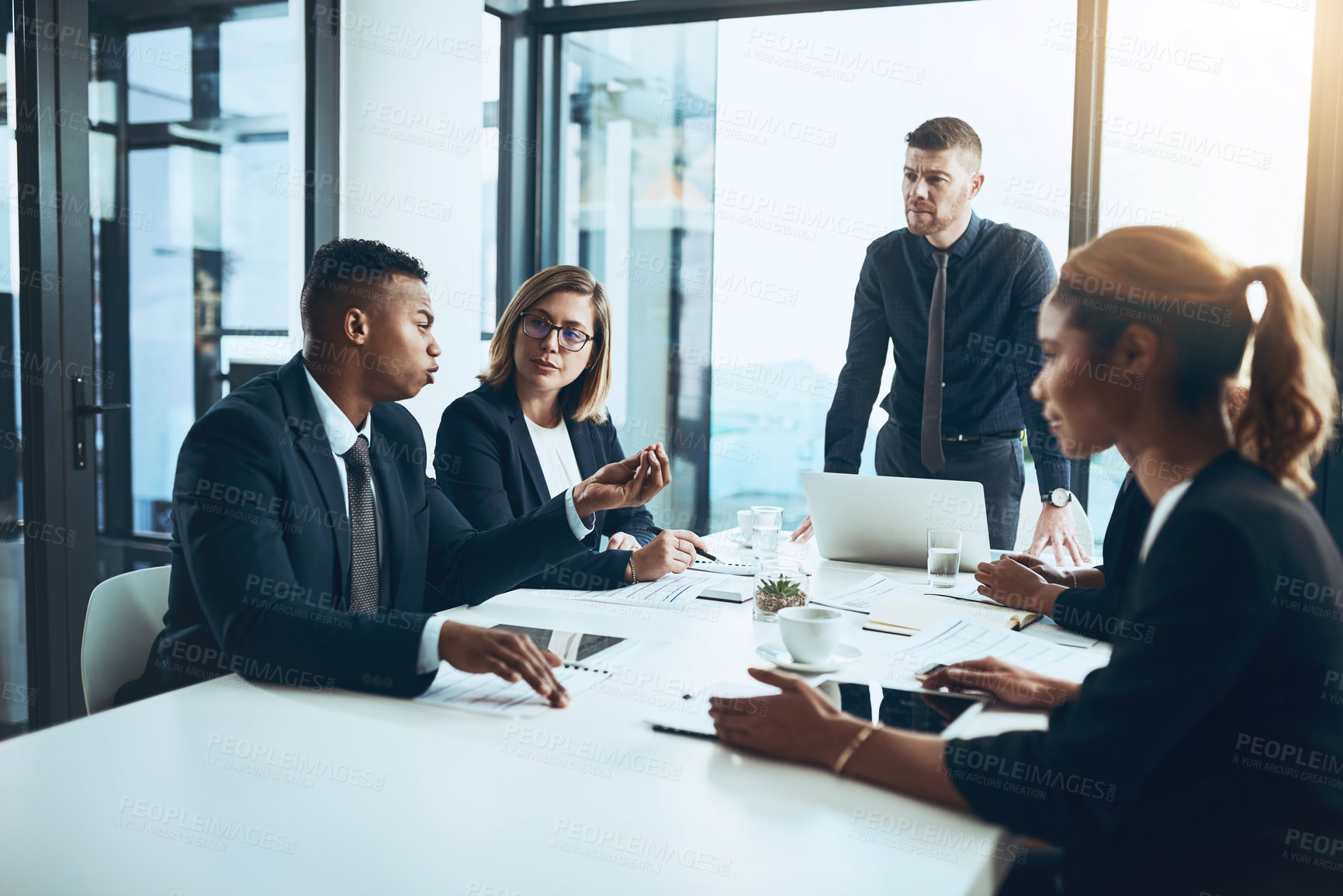 Buy stock photo Businessman, group and discussion in boardroom for planning, ideas and briefing with attention. Collaboration, team leader and explain with listening, strategy and meeting for project in office