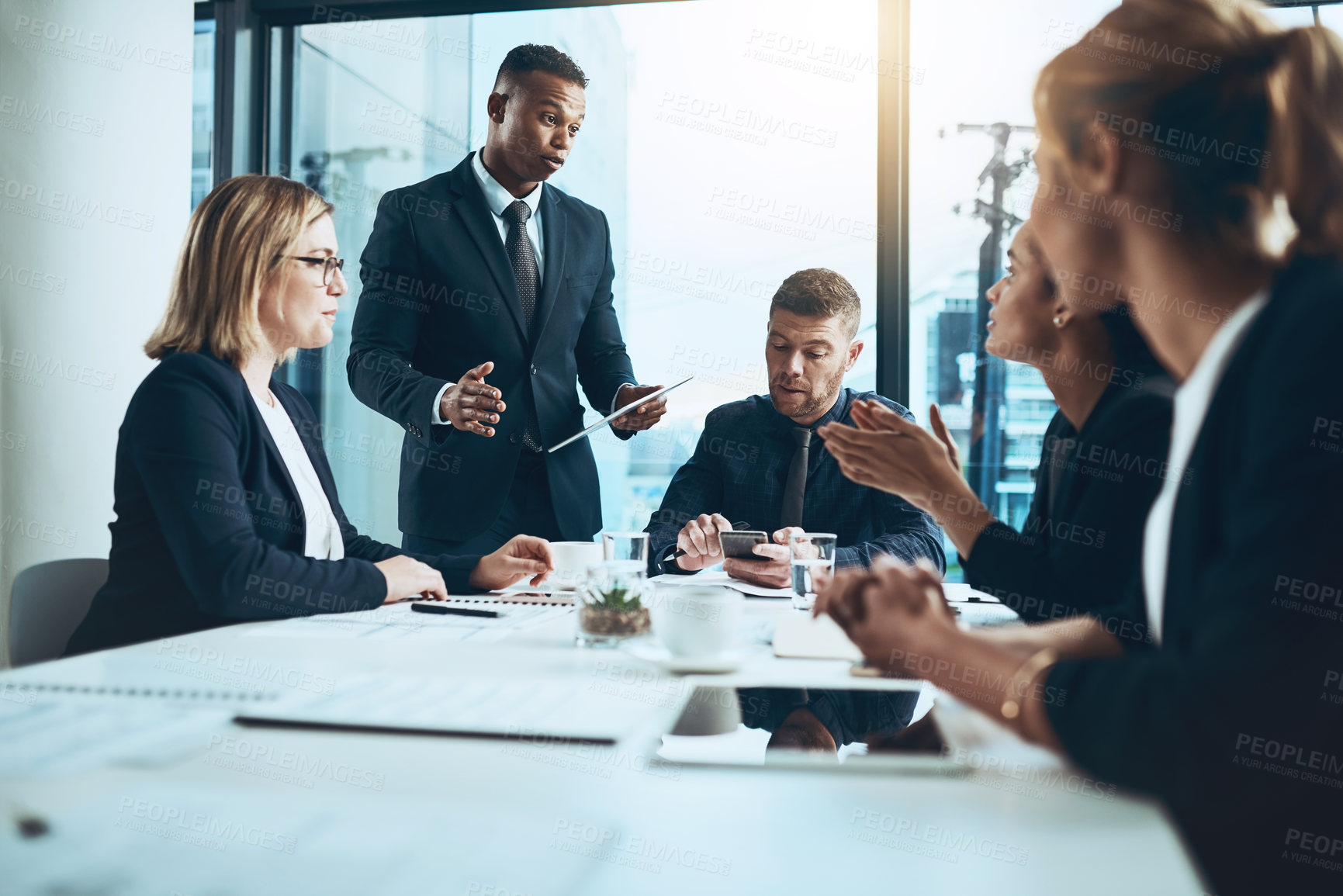 Buy stock photo Business people, meeting and conversation with tech in office for report, analysis or project. Accounting, employees and feedback with tablet for brainstorming, planning or proposal for document