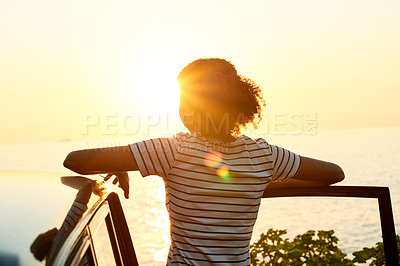 Buy stock photo Sunrise, morning and back of woman by car for road trip, adventure and travel destination by ocean. Thinking, relax and person by vehicle for holiday, summer vacation and journey in countryside