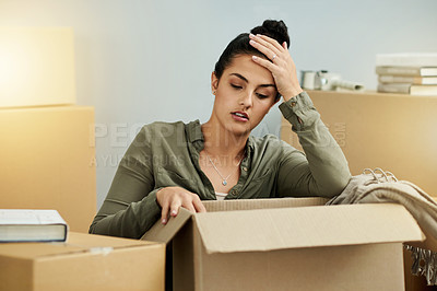 Buy stock photo Frustrated woman, stress and box with anxiety for mistake, home repossession or eviction notice. Upset, female person or depression for mortgage debt, lease violation or economic inflation in house