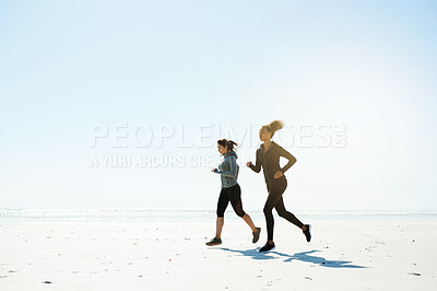 Buy stock photo Fitness, women and running on beach for training, wellness or cardio exercise with space. Friends, runners and challenge at ocean for competitive workout, endurance or marathon practice together
