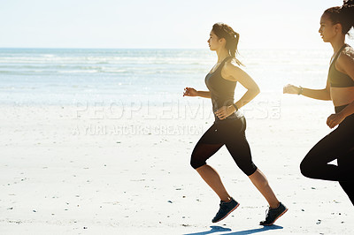Buy stock photo Fitness, women and friends running at beach for workout, training and health outdoor in nature. Team, runners and exercise by ocean together for endurance, cardio and jog for sports with space