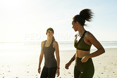 Buy stock photo Beach, personal trainer and women on break, fitness and healthy with training in nature or exercise. Outdoor, athlete and practice for marathon with instructor, space and happy for workout routine