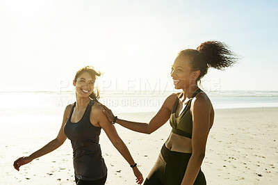 Buy stock photo Happy, athlete and friends with women on beach for fitness, running break and bonding together. Space, people and walking for cardio exercise, sports training and recovery from workout for wellness
