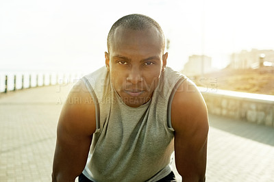 Buy stock photo Portrait, fitness and man on boardwalk for rest, outdoor training and cardio for exercise session. Serious, pause and  athlete on promenade to run, workout set and break for muscle recovery.
