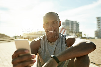 Buy stock photo Fitness, black man and portrait with phone in city for running break, exercise app and online news. Morning, happy athlete and rest with smartphone outdoor for cardio pause, social media and texting