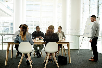 Buy stock photo Business, presentation and man in office, team and communication with investment deal. Finance agency, people or speaker in meeting, discussion or feedback for profit growth, cooperation and review
