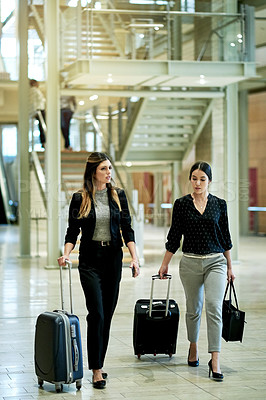 Buy stock photo Walking, lobby and luggage with business people in hotel for conference, booking accommodation and seminar. Convention arrival, suitcase and reservation with employees for hospitality and trip