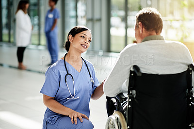 Buy stock photo Woman, nurse and man with a disability in hospital for recovery, support or healing. Healthcare, rehabilitation and mature patient in wheelchair with caregiver, smile and help for checkup in clinic