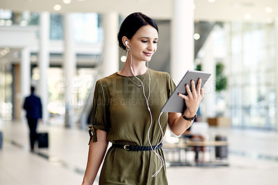 Buy stock photo Earphones, smile and businesswoman in airport with suitcase for online meeting or contact. Digital technology, audio tech and female employee on virtual discussion with luggage for work trip.
