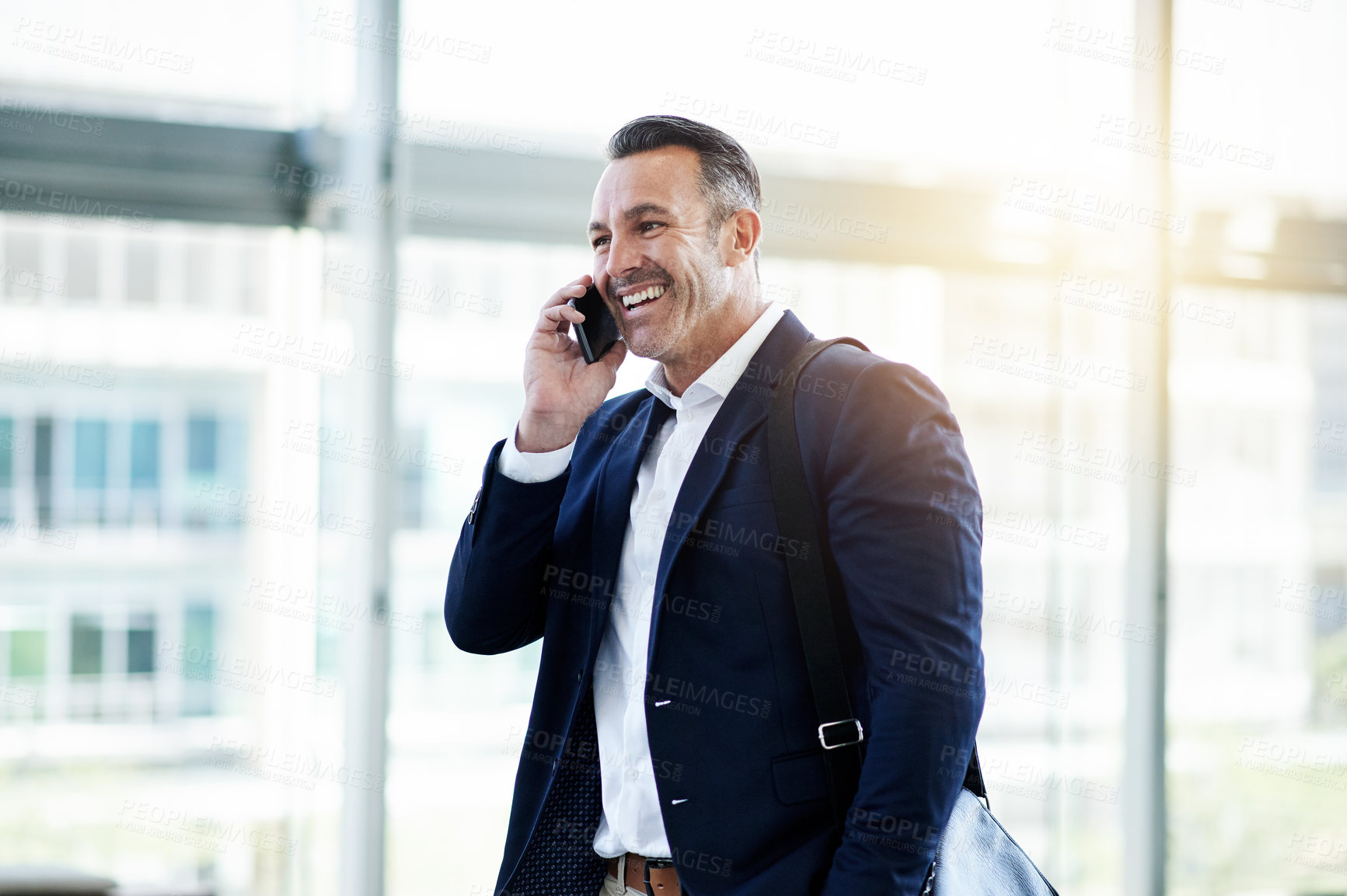 Buy stock photo Phone call, laugh and business man in office for negotiation, insurance offer or communication. Talk, mobile and mature broker in workplace for conversation, funny joke and feedback for claims update