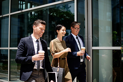 Buy stock photo Walking, corporate and people in city with coffee, morning commute and conversation for networking. Happy, business team and chat outdoor in urban town with drink, travel and journey to workplace.