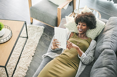 Buy stock photo Tablet, relax and search with black woman on sofa for social media, connection and communication. Reading, networking app and streaming with above of person in living room of home for digital post