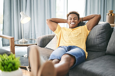 Buy stock photo Relax, happy and portrait of black man on sofa for chilling, rest and comfortable on weekend. Apartment, home and person lying on couch for break, calm and free time with smile, wellness and peaceful