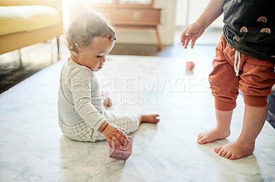 Buy stock photo Baby, living room and kids play with toys for bonding, quality time and child development at home. Family, siblings and children playing with shape, building blocks and relax together on house floor