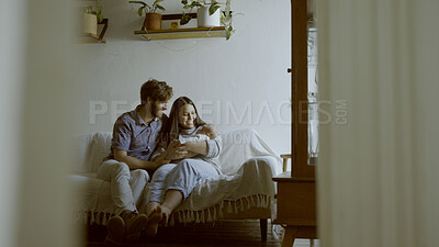 Buy stock photo Support, mom or dad with baby in a happy family to relax or bond together for child development. Smile, home or excited father with a proud mother or newborn infant for love, safety or trust on sofa