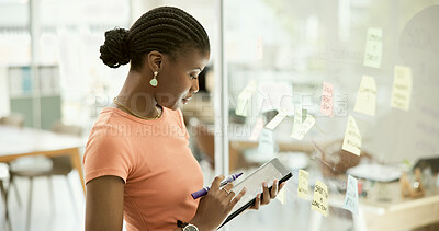 Buy stock photo Black woman, tablet and creative idea or planning, strategy or schedule on glass board at office. African female person with technology for brainstorming, tasks or agenda in startup at workplace