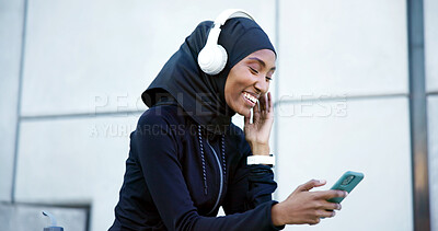 Buy stock photo Headphones, fitness or muslim woman with mobile outdoor, listen to radio or audio break with smile. Hijab, happy runner and black person with phone, music and streaming song with podcast in city