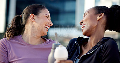 Buy stock photo Laughing, fitness and happy women in city for funny joke, humor or outdoor bonding together. Active, female people or comedy with smile or relationship for workout break, exercise or rest in town