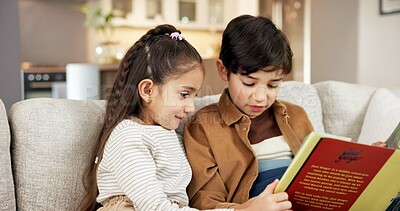 Buy stock photo Siblings, reading and children with book in lounge, education and cognitive growth with literature. Happy, sister and brother with fiction story, literacy and kids with skill development in house