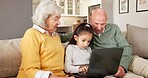 Grandparents, relax and child at house with laptop, streaming and download games for education. Old people, babysitting and grandchild in home with tech, internet search and online quiz for learning
