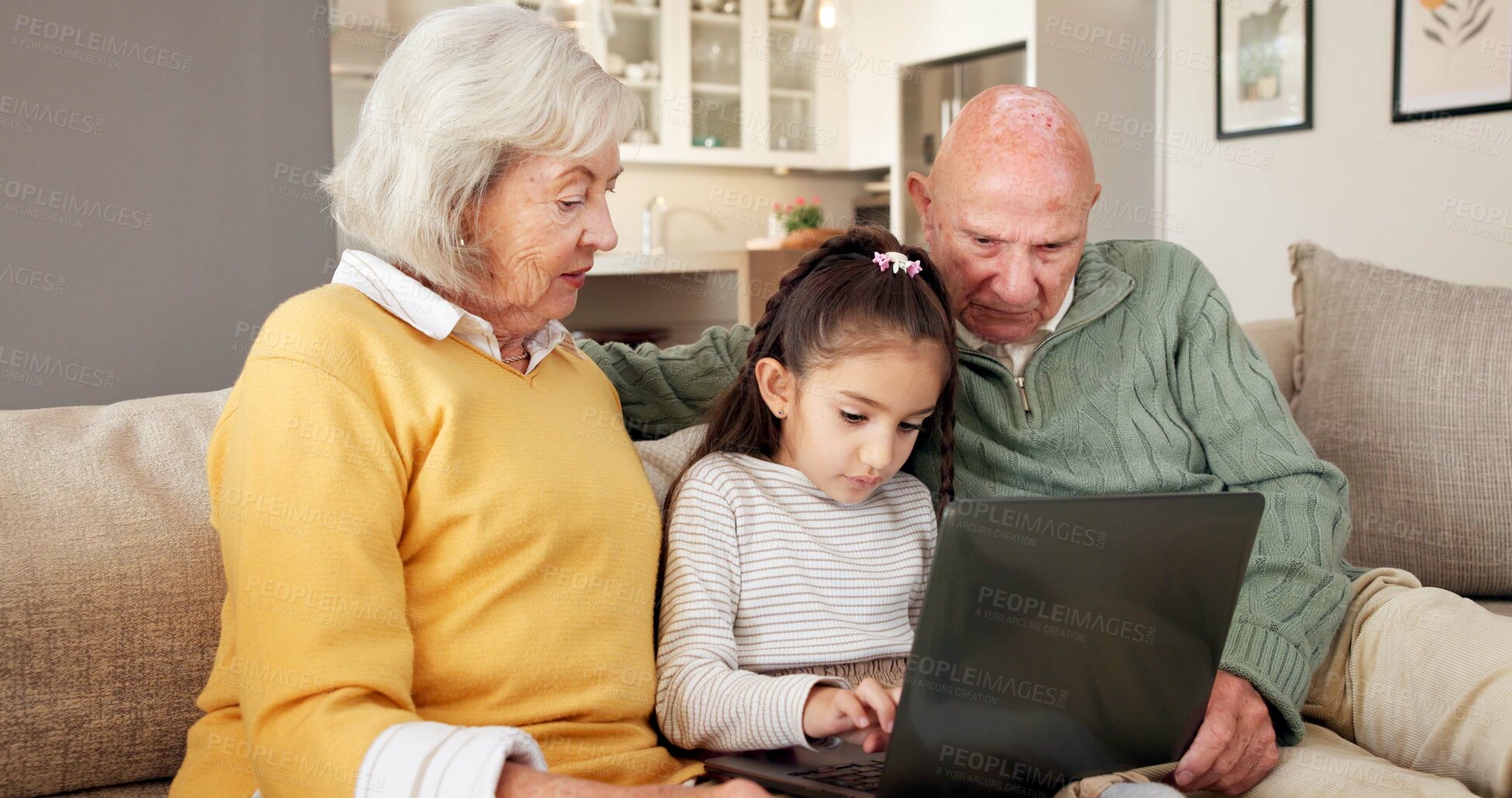 Buy stock photo Grandparents, relax and child at house with laptop, streaming and download games for education. Old people, babysitting and grandchild in home with tech, internet search and online quiz for learning
