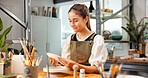 Pottery, design or happy woman in workshop with review, color process or plate inspection in art hobby. Smile, clay or person with check, ceramic craft or creative evaluation in handcraft activity.