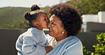 Family, grandmother and toddler with kiss outdoor, love and connection with quality time on vacation. Black woman, girl kid and affection in nature with bonding, relationship and together on holiday