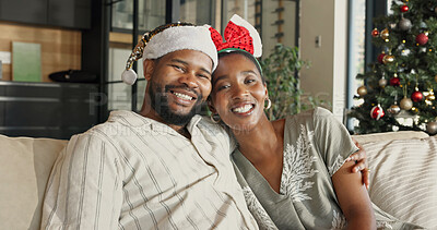 Buy stock photo Christmas, portrait or black couple with hug in home for festive celebration, comfort or holiday. Happy, man and woman relaxing on sofa for December vacation, weekend or bonding together in house