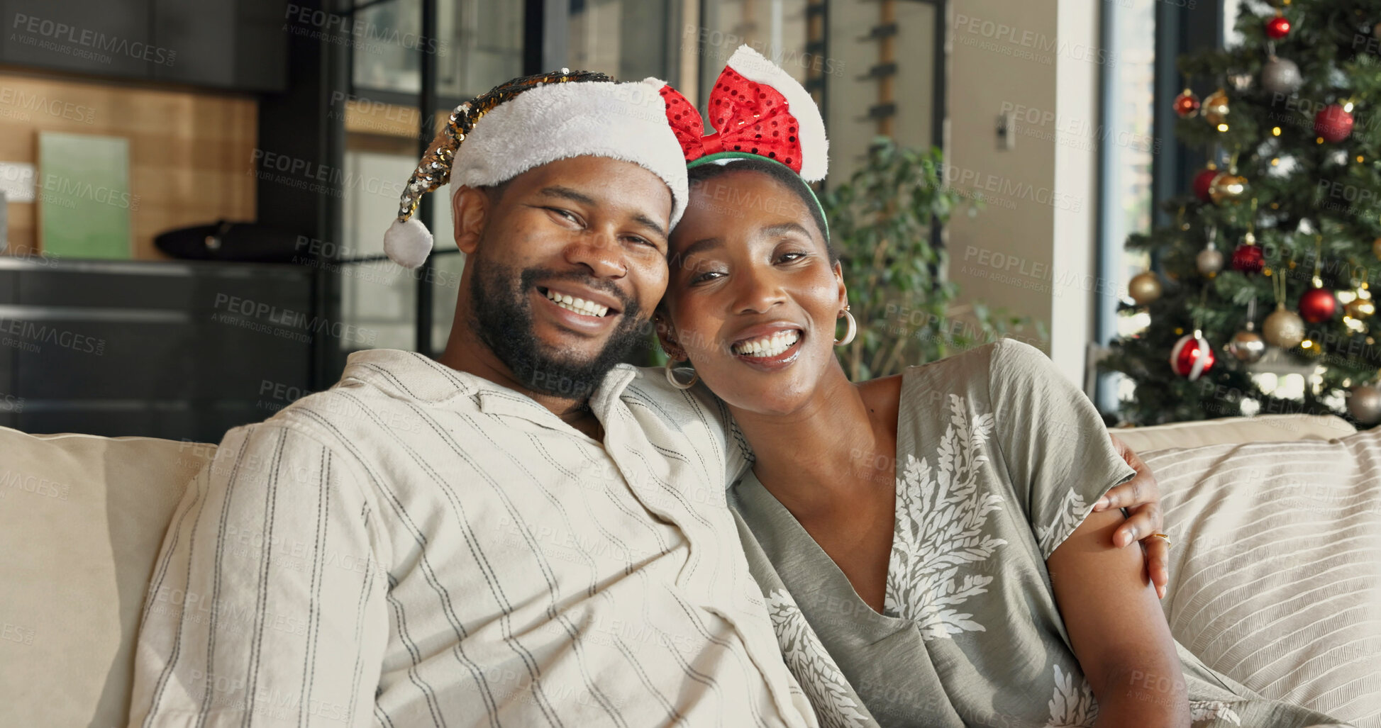 Buy stock photo Christmas, portrait or black couple with hug in home for festive celebration, comfort or holiday. Happy, man and woman relaxing on sofa for December vacation, weekend or bonding together in house