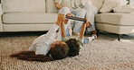 Children, online and bonding with tablet, home and watch cartoons with app subscription in lounge. Siblings, relax and streaming movie with technology, family and kids with parents in living room