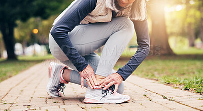 Buy stock photo Senior, woman and hands with shoe tying in park for outdoor workout preparation or exercise. Active, elderly or female person getting ready with sneakers or laces for fitness or training in nature