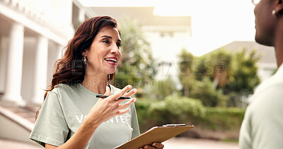 Buy stock photo Clipboard, volunteer and happy woman with partner for team donation, checklist or charity campaign. Female person, activist and community service with smile or colleague for outdoor outreach together