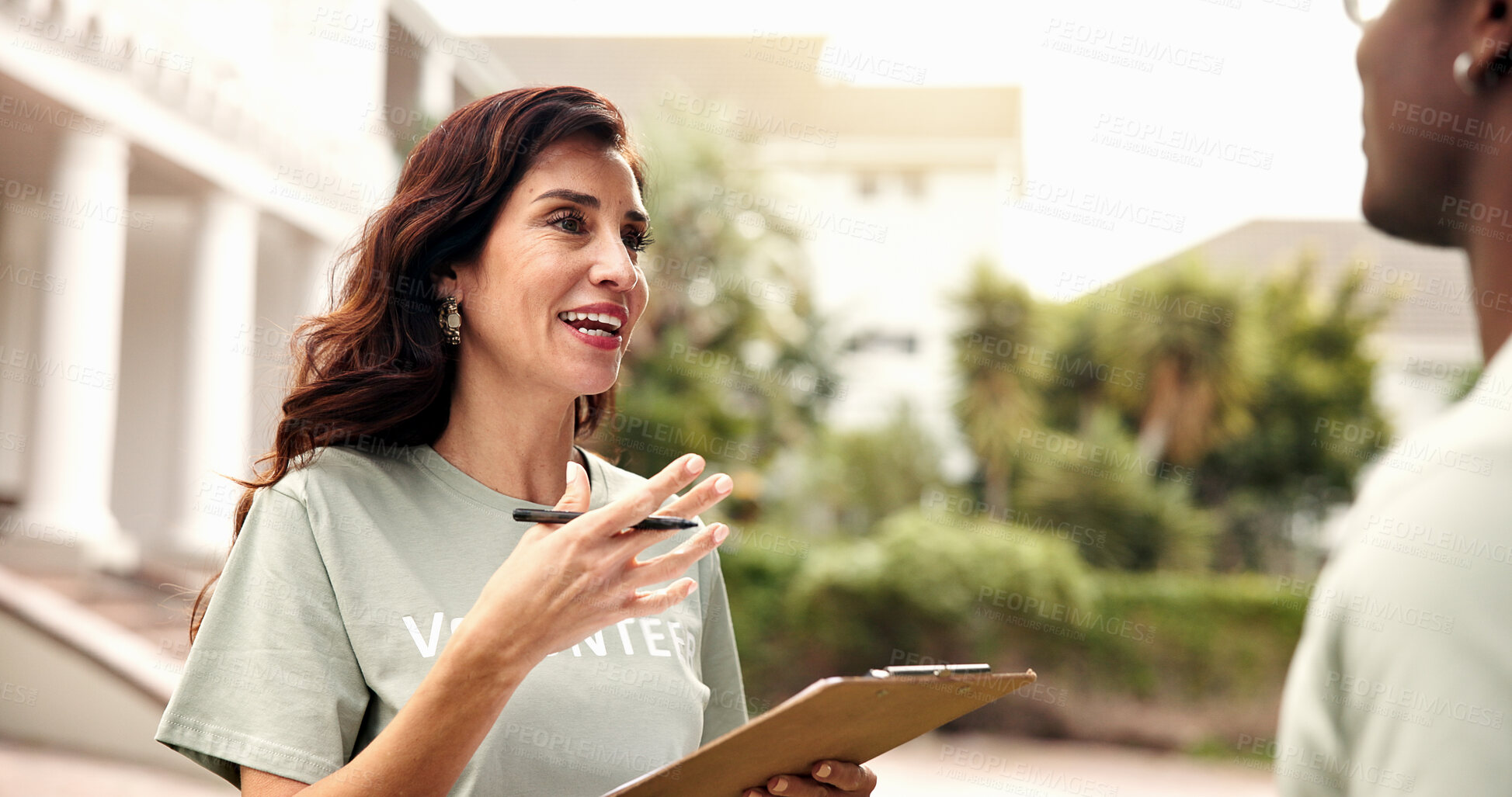 Buy stock photo Clipboard, volunteer and happy woman with partner for team donation, checklist or charity campaign. Female person, activist and community service with smile or colleague for outdoor outreach together