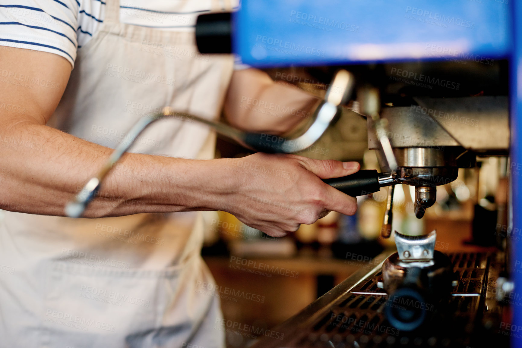 Buy stock photo Hands, barista and portafilter at machine in cafe for coffee preparation, espresso brew and order. Restaurant, service and man with process for premium blend caffeine, latte beverage and hospitality