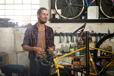 Buy stock photo Happy, technician and man with bicycle, shop and repairing eco friendly transport, think or service. Fixing, bike and person with ideas for maintenance, reflection or entrepreneur with smile in store
