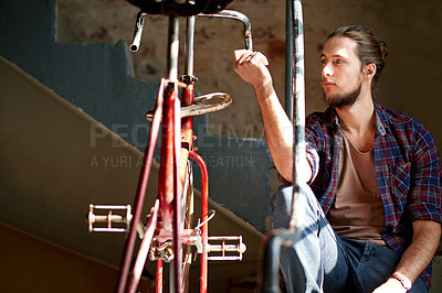 Buy stock photo Man, thinking and bicycle in city on stairs for break with eco friendly transportation for commute. Person, bike and outdoor in urban town for travel, trip or rest on cycling journey in Portugal