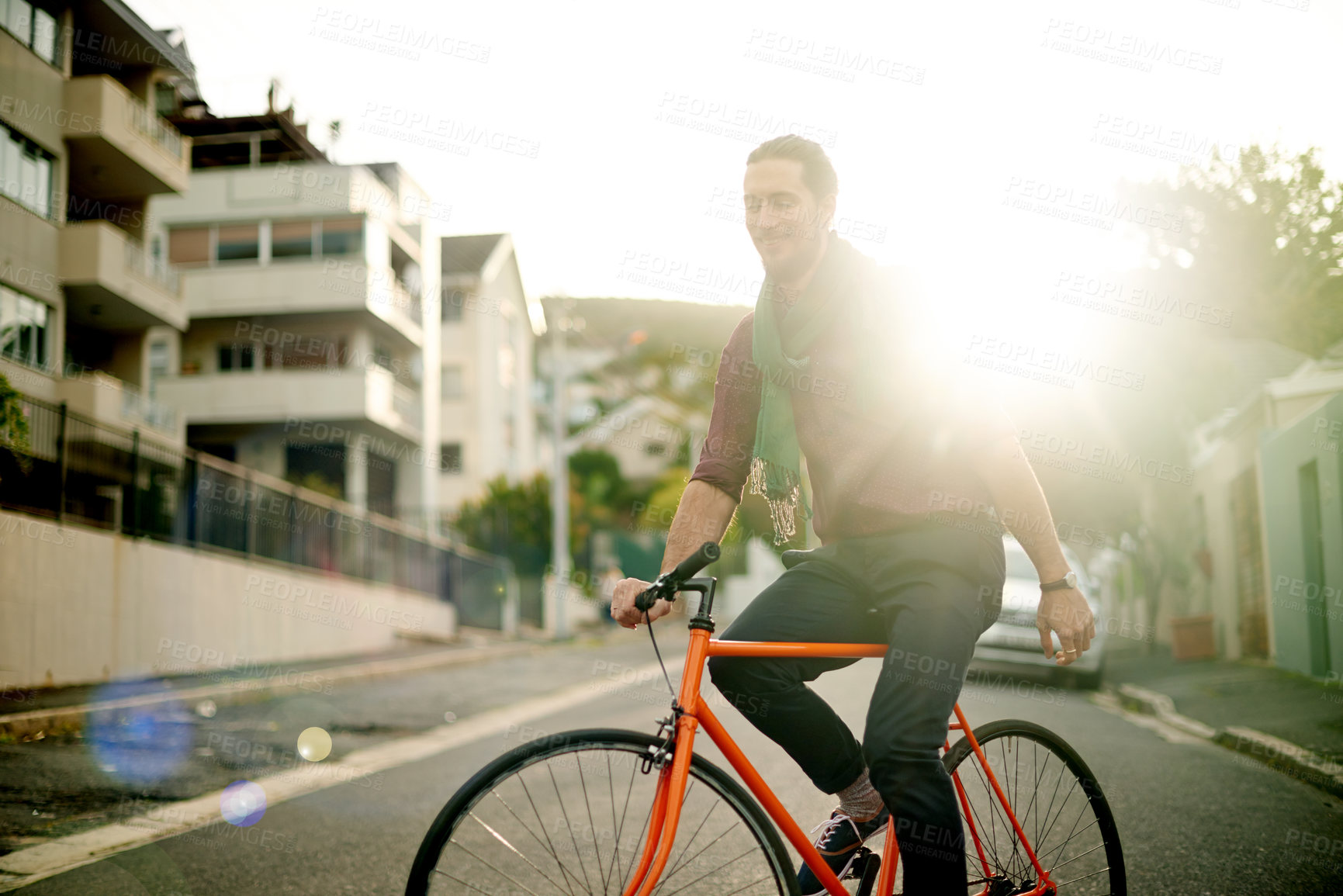 Buy stock photo Travel, commuting and man on bicycle in city for adventure, journey or carbon footprint on holiday. Street, cycling and person on bike for eco friendly transport on vacation in urban town by sunset.