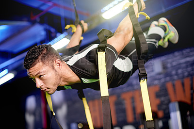 Buy stock photo Man, gymnastics or air with harness for sport practice, flexibility or balance in gym. Male person, gymnast or physical exercise with core strength for fitness training, technique or mobility in club