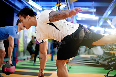Buy stock photo Kettlebell, workout and class with coach in gym for training bootcamp, bodybuilder or fitness. Health challenge, weightlifting and muscle with group of people in sports club for exercise and learning