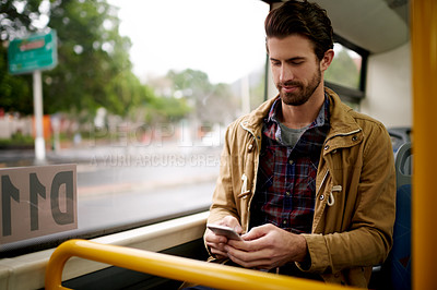 Buy stock photo Reading, phone and window with man on bus for location, traffic app update and network. Public transportation, travel and tourism with person and typing online for journey, social media and metro map