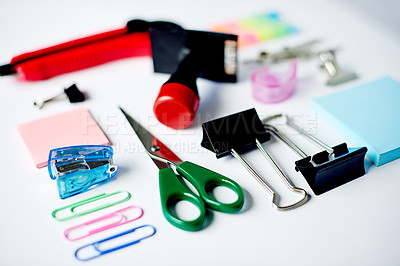 Buy stock photo Business, flat lay and stationery on table in workstation, ready for creative planning or design. Scissors, stamp and utility knife on desk in empty office for productivity process from above