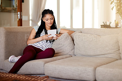 Buy stock photo Woman, tablet and scroll on sofa, relax and search with smile, video or film streaming at home. Person, click and tech in lounge for app, movie subscription or social network on couch at apartment