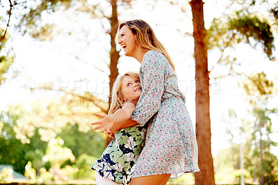 Buy stock photo Smile, mother and hug child at park for freedom, playful games or bonding together on holiday getaway. Happy, woman and embrace kid with energy, love and laughing with affection on vacation in nature