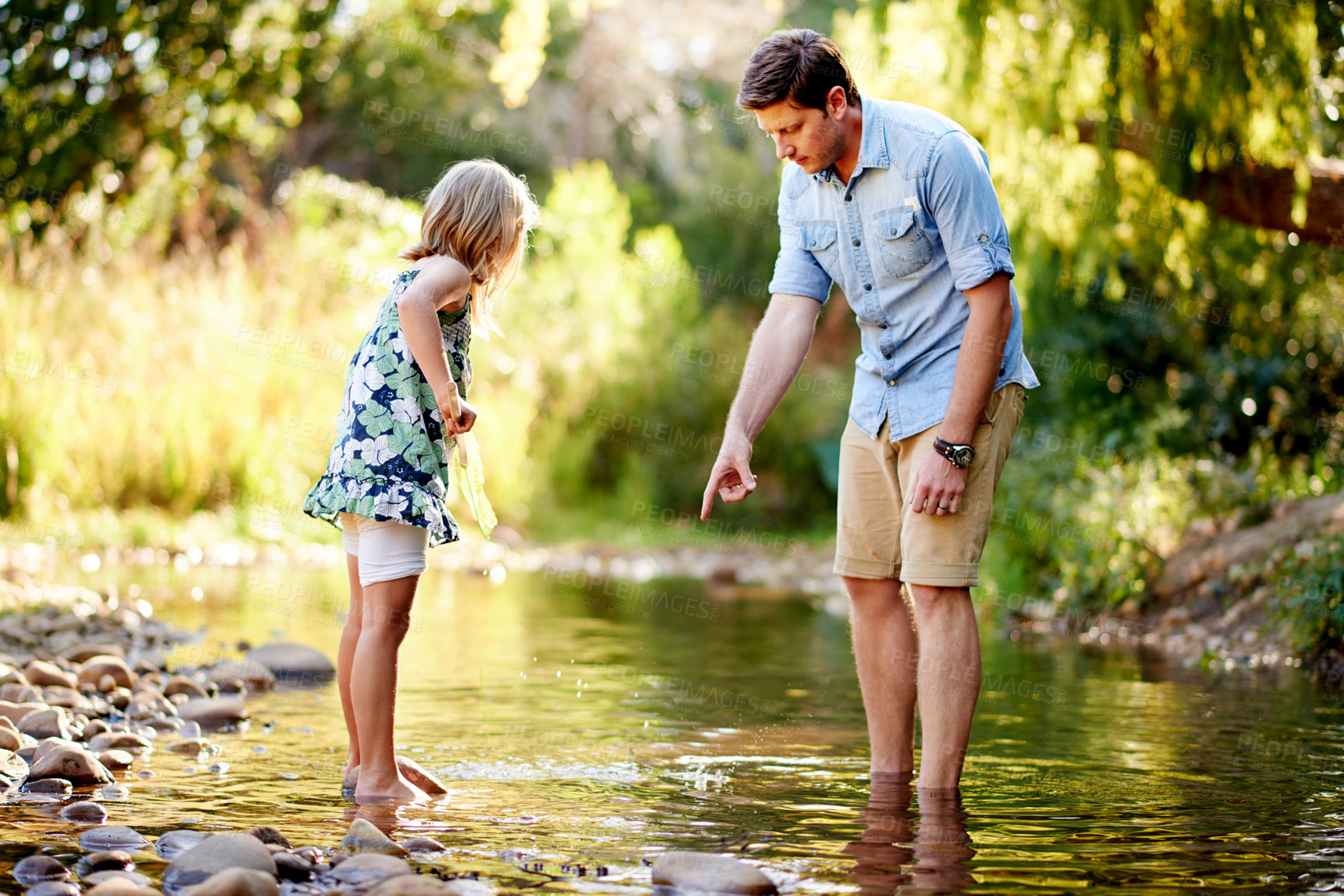 Buy stock photo Nature, man and child with net in river together for bonding, outdoor fun and educational activity. Discovery, caring father and girl in woods for learning opportunity, catch or support in connection