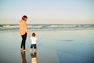 Buy stock photo Holding hands, beach and back of mom with child for bonding, summer vacation and holiday together. Family, space and mother with kid with sky, ocean and seaside for fun, adventure and weekend outdoor