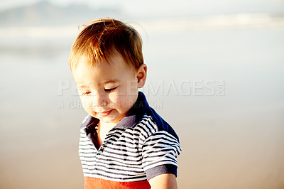 Buy stock photo Boy, toddler and explore at beach with childhood, holiday and space outdoor for travel. Adventure, nature and mockup for summer fun with male kid by ocean, games or playing with vacation in Spain