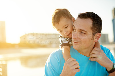 Buy stock photo Dad, baby and piggyback at beach with sunset space, connection or love for father son bonding on holiday. Man, boy child with hug outdoor, sunshine and adventure with travel support in Australia
